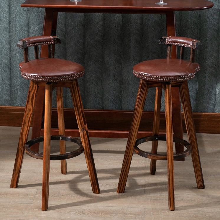 Tabouret de bar pivotant contemporain rétro rond en similicuir avec pieds en bois, dossier bas et repose-pieds pour salle à manger 