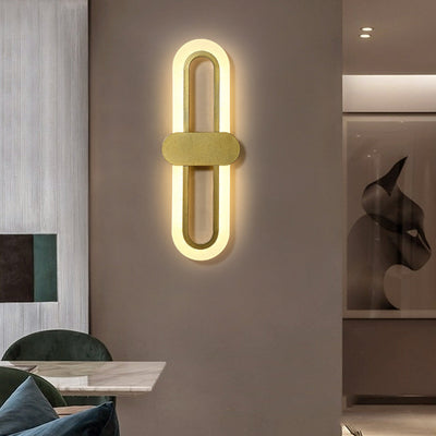 Applique murale LED en fer acrylique ovale de simplicité contemporaine pour salon 
