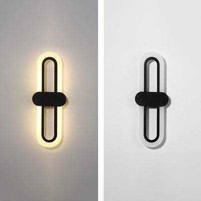 Applique murale LED en fer acrylique ovale de simplicité contemporaine pour salon 