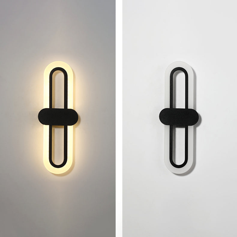 Applique murale LED en fer acrylique ovale de simplicité contemporaine pour salon 