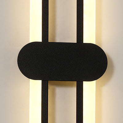 Applique murale LED en fer acrylique ovale de simplicité contemporaine pour salon 