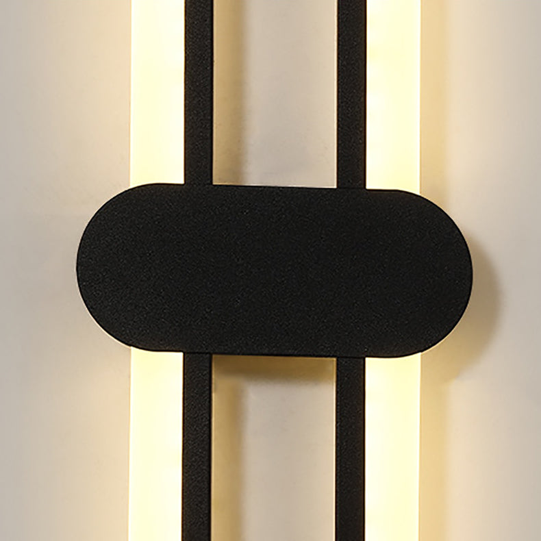 Applique murale LED en fer acrylique ovale de simplicité contemporaine pour salon 
