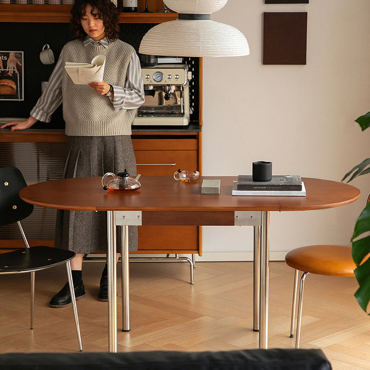 Table à manger moderne minimaliste pliable ovale en bois avec plateau en mélamine pour 4 places en acier inoxydable 