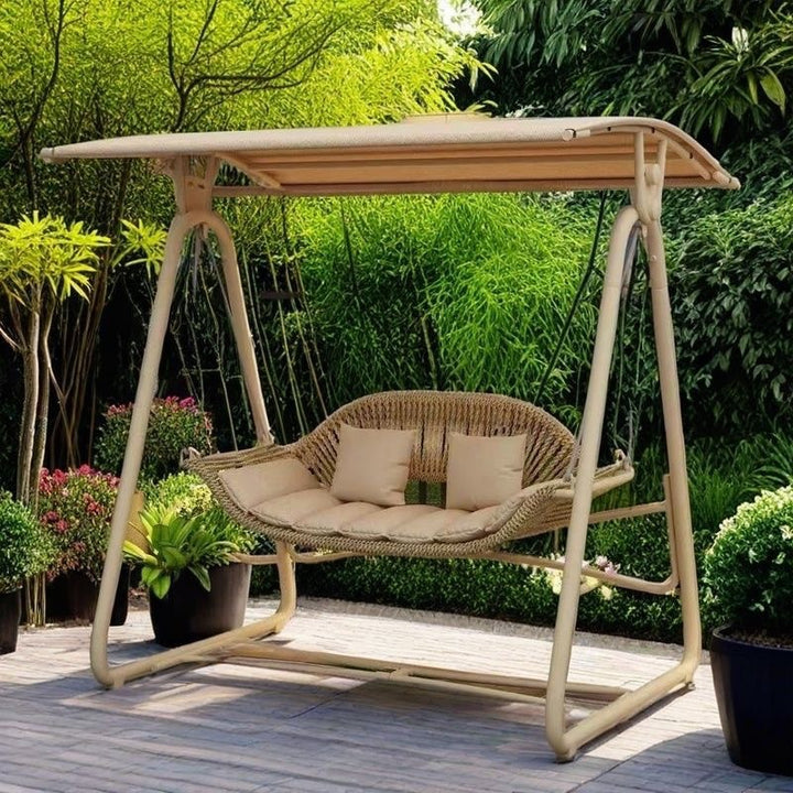 Chaise à bascule d'extérieur contemporaine en acier nordique et rotin PE pour 2 personnes avec coussins imperméables et auvent pour jardin et arrière-cour 