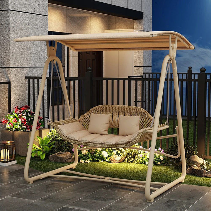 Chaise à bascule d'extérieur contemporaine en acier nordique et rotin PE pour 2 personnes avec coussins imperméables et auvent pour jardin et arrière-cour 