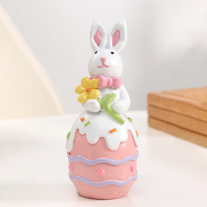 Figurine décorative contemporaine en résine de lapin de Pâques créatif avec accent œuf pour salon et décoration de fête 
