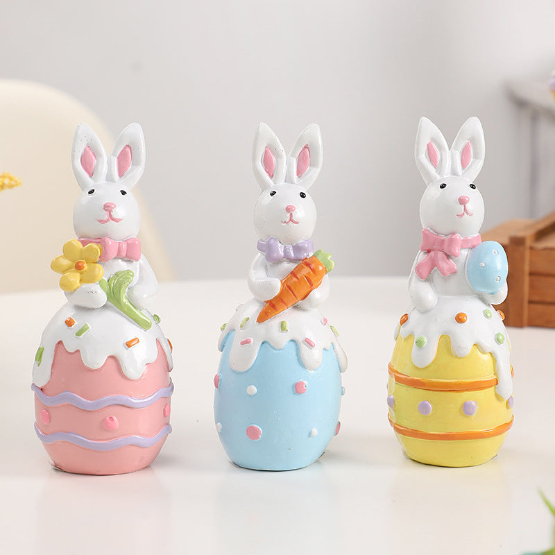 Figurine décorative contemporaine en résine de lapin de Pâques créatif avec accent œuf pour salon et décoration de fête 