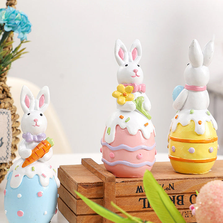 Figurine décorative contemporaine en résine de lapin de Pâques créatif avec accent œuf pour salon et décoration de fête 