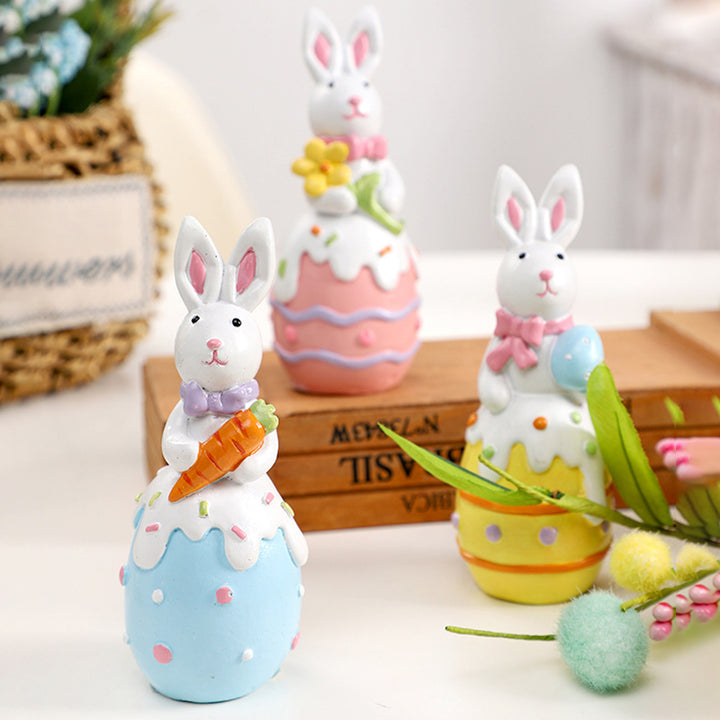 Figurine décorative contemporaine en résine de lapin de Pâques créatif avec accent œuf pour salon et décoration de fête 