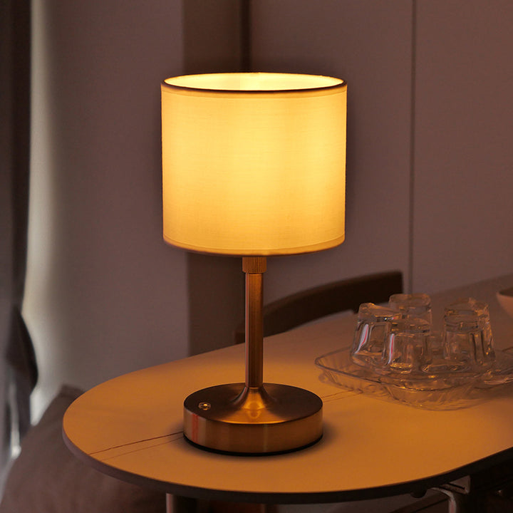 Lampe de table moderne minimaliste en métal cylindrique relevable avec tissu 1 lumière pour chambre 