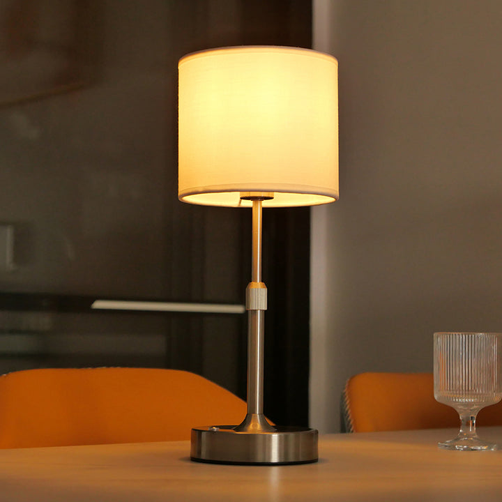 Lampe de table moderne minimaliste en métal cylindrique relevable avec tissu 1 lumière pour chambre 