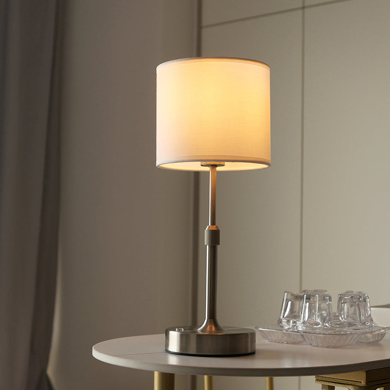 Lampe de table moderne minimaliste en métal cylindrique relevable avec tissu 1 lumière pour chambre 