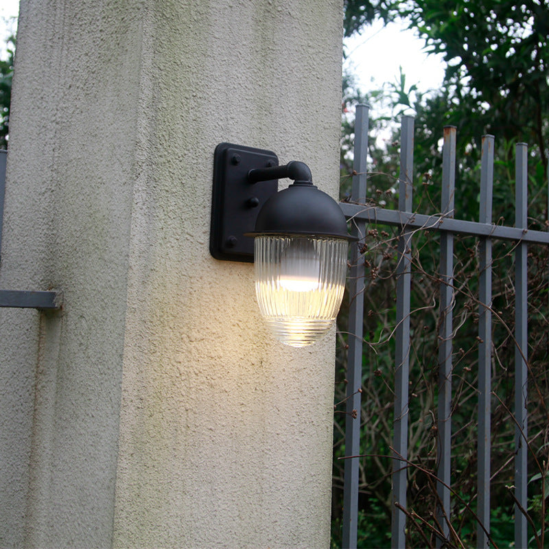 Moderne minimalistische wasserdichte nussförmige Aluminium-Glas 1-Licht Außenwandleuchte für Gärten 
