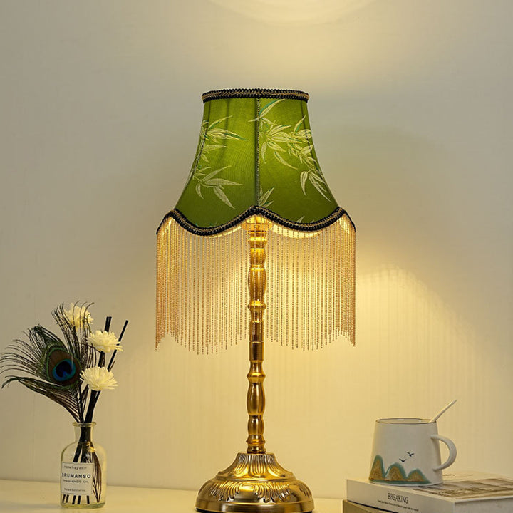 Lámpara de mesa de 1 luz con diseño de bambú cilíndrico vintage tradicional y borla de hierro para dormitorio 