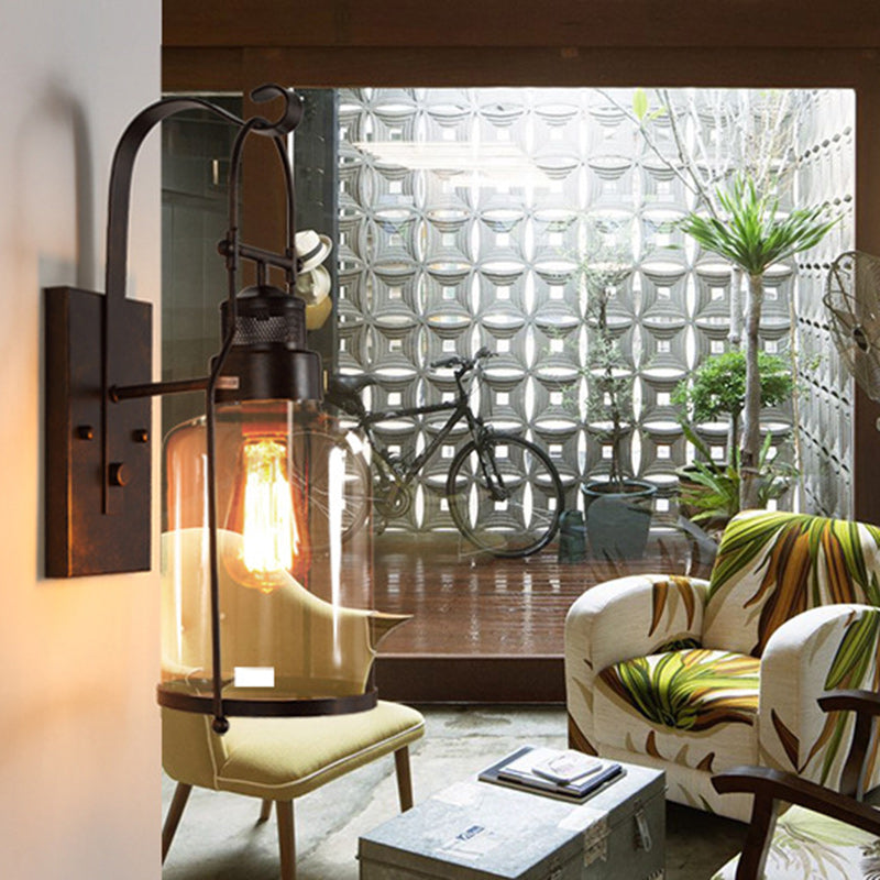 Traditionelle koloniale Kesselform Eisen Glas 1-Licht Wandleuchte für Wohnzimmer 