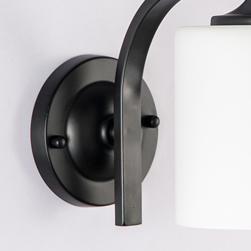 Lampe murale à une lumière en fer avec abat-jour en verre cylindrique de simplicité moderne pour salon 