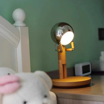 Lampshade en fer d'astronaute créatif contemporain avec base en bois et lampe de table LED pour chambre 