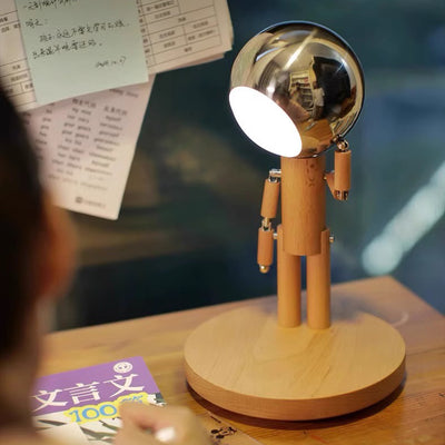 Lampshade en fer d'astronaute créatif contemporain avec base en bois et lampe de table LED pour chambre 