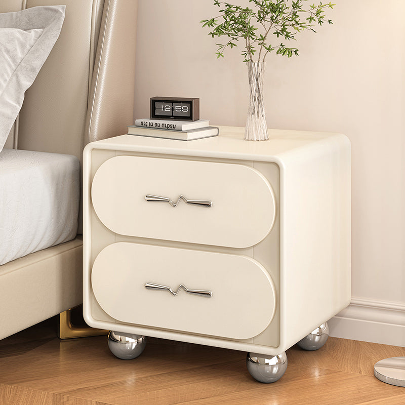 Mesita de noche contemporánea creativa de madera maciza con cuero sintético redondeada rectangular con almacenamiento de 2 cajones para dormitorio 