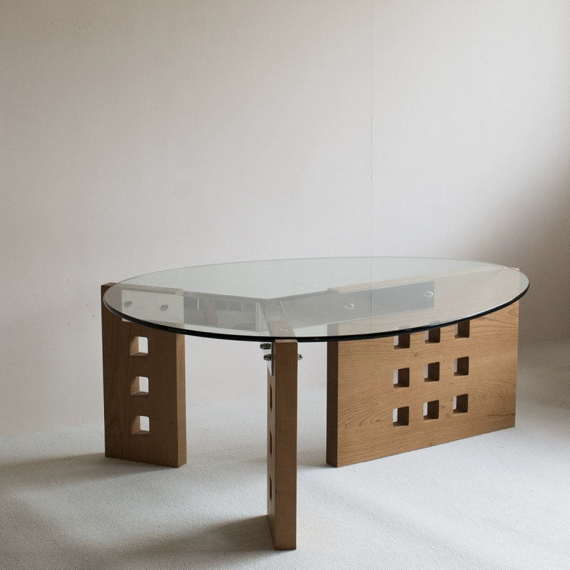 Moderner minimalistischer Couchtisch aus gehärtetem Glas, Edelstahl und massivem Holz mit ovaler Form und perforiertem Sockel, einlagiger Tisch für das Wohnzimmer 