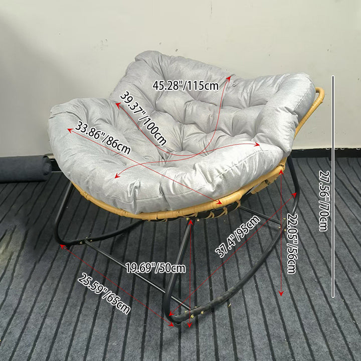 Moderner minimalistischer Schaukelstuhl mit geschwungener Vogelnest-Form aus Kohlenstoffstahl, Leinenmischgewebe, synthetischem Stoff und PE-Rattan, mit Rückenlehne, ohne Armlehnen, für das Wohnzimmer 