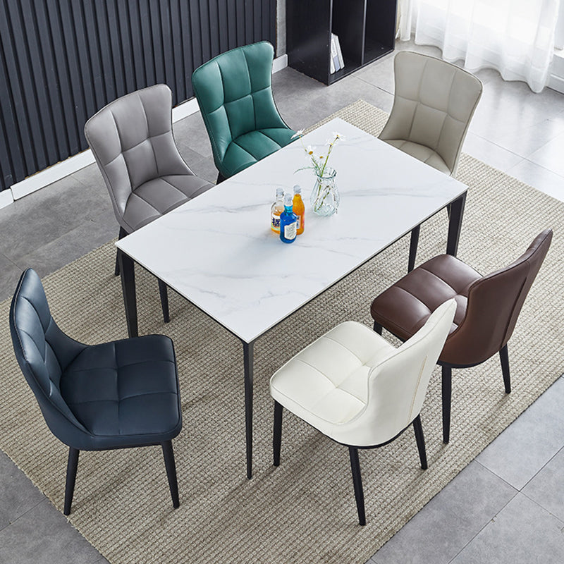 Silla de comedor de lujo contemporáneo rectangular de cuero PU de acero al carbono con respaldo sin brazos para comedor y cocina 