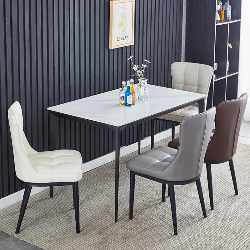 Silla de comedor de lujo contemporáneo rectangular de cuero PU de acero al carbono con respaldo sin brazos para comedor y cocina 