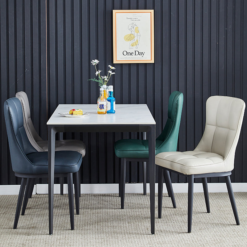 Silla de comedor de lujo contemporáneo rectangular de cuero PU de acero al carbono con respaldo sin brazos para comedor y cocina 