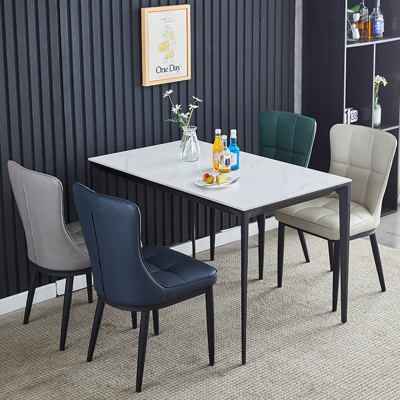 Silla de comedor de lujo contemporáneo rectangular de cuero PU de acero al carbono con respaldo sin brazos para comedor y cocina 