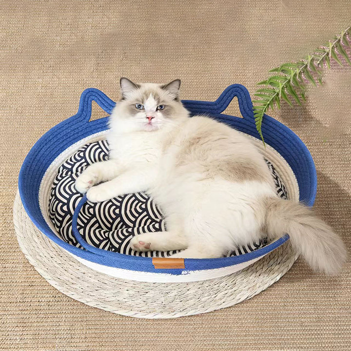 Lit pour chat en coton et lin au design cylindrique créatif contemporain avec oreilles de chat et balle jouet pour chambre 