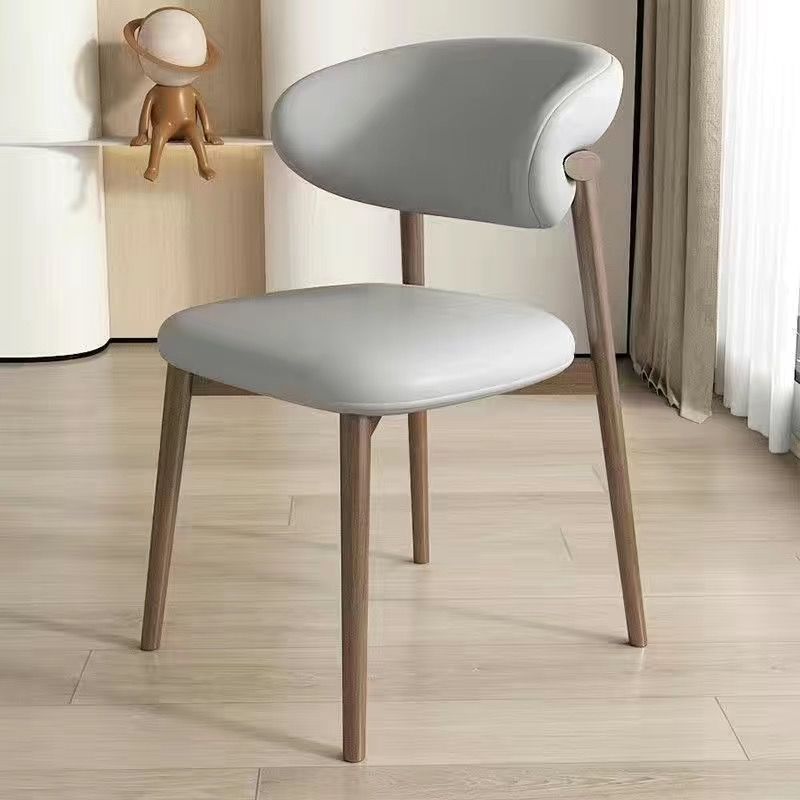 Silla de comedor contemporánea nórdica de madera y cuero sintético con respaldo redondo para comedor 