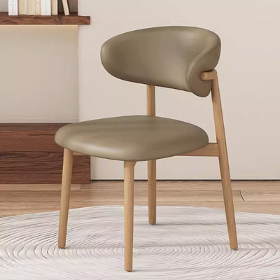 Silla de comedor contemporánea nórdica de madera y cuero sintético con respaldo redondo para comedor 