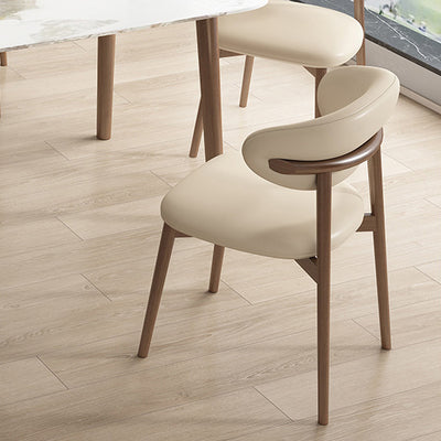 Silla de comedor contemporánea nórdica de madera y cuero sintético con respaldo redondo para comedor 