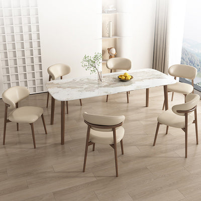 Silla de comedor contemporánea nórdica de madera y cuero sintético con respaldo redondo para comedor 