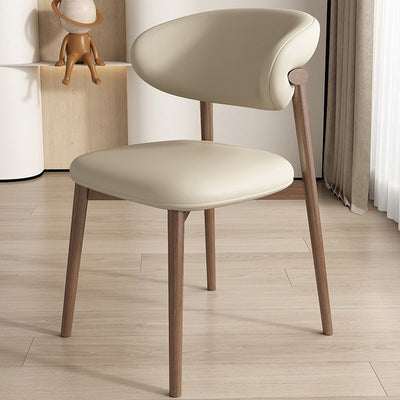 Silla de comedor contemporánea nórdica de madera y cuero sintético con respaldo redondo para comedor 