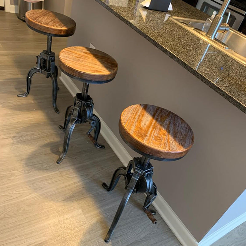 Tabouret de bar moderne minimaliste rond en fer et bois massif avec réglage de la hauteur pour salle à manger 