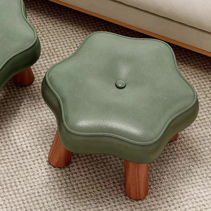 Moderner nordischer niedriger Hocker in Blumenform aus PU-Leder und Kiefernholz für das Wohnzimmer 