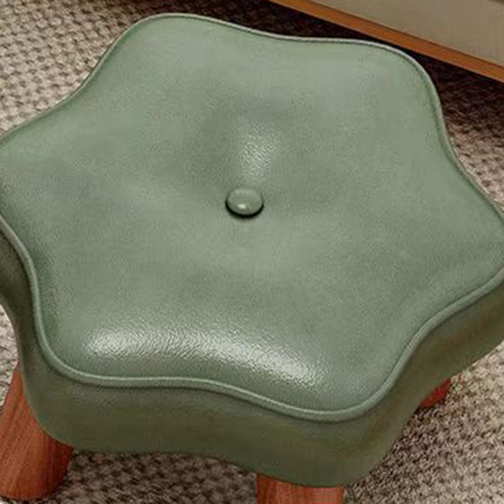 Moderner nordischer niedriger Hocker in Blumenform aus PU-Leder und Kiefernholz für das Wohnzimmer 