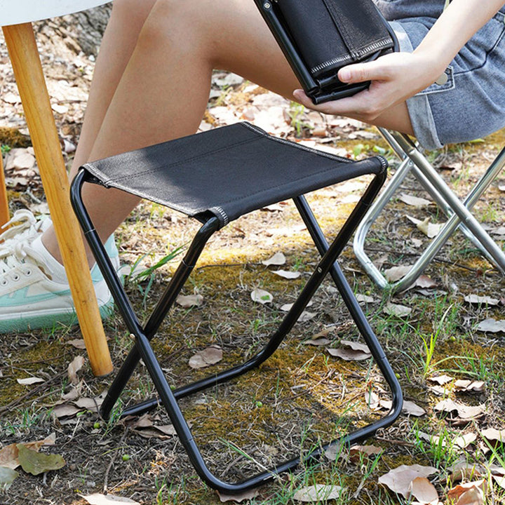 Tabouret bas pliant carré en tissu minimaliste moderne et acier au carbone avec design portable pour patio extérieur 