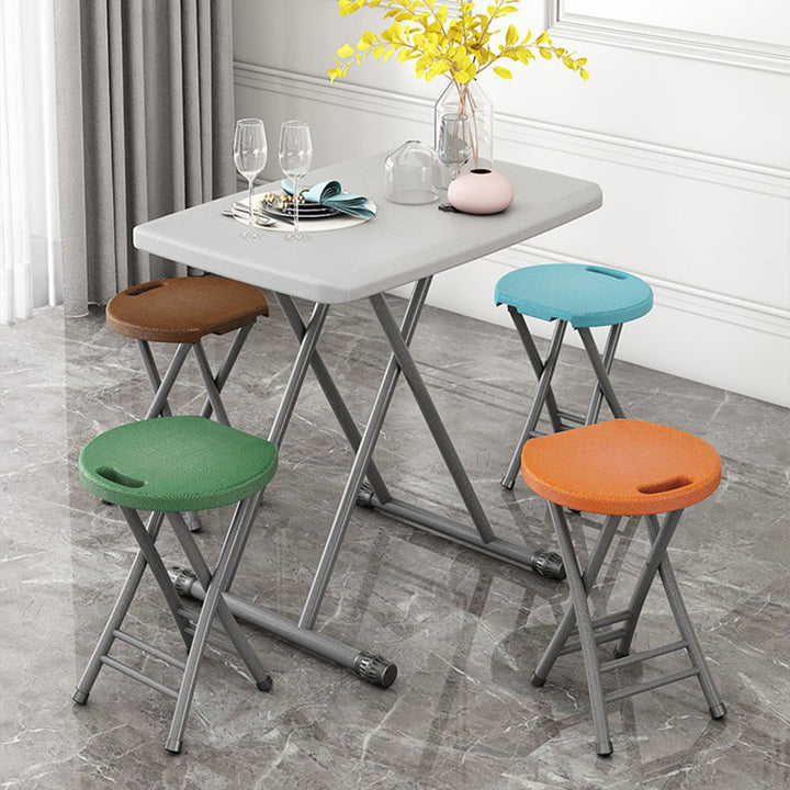 Moderner minimalistischer PP- und Kohlenstoffstahl-Matte-Rundklappstuhl mit tragbarem Design für Küche und Esszimmer 