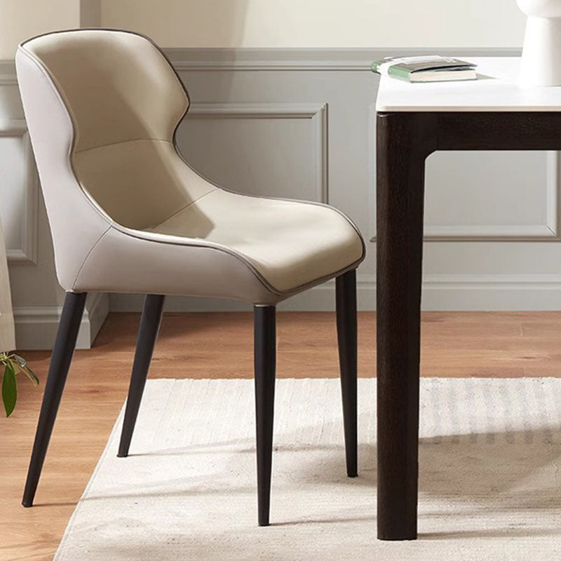 Contemporary Scandinavian Curved Rectangular PU Leather Carbon Steel Dining Chair Backrest Armless For Dining Room