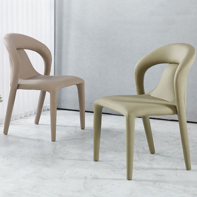 Moderna silla de comedor minimalista cuadrada tapizada en cuero artificial con respaldo de acero al carbono para comedor 