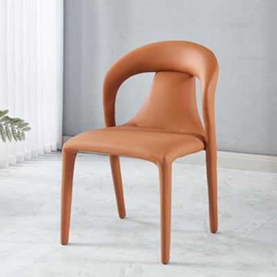 Moderna silla de comedor minimalista cuadrada tapizada en cuero artificial con respaldo de acero al carbono para comedor 