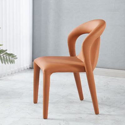 Moderna silla de comedor minimalista cuadrada tapizada en cuero artificial con respaldo de acero al carbono para comedor 