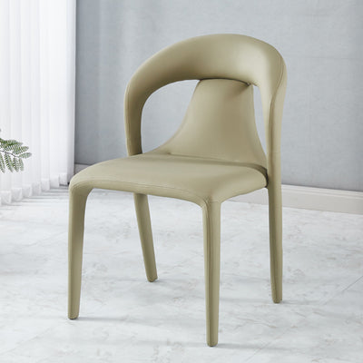 Moderna silla de comedor minimalista cuadrada tapizada en cuero artificial con respaldo de acero al carbono para comedor 