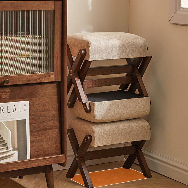 Tabouret bas moderne minimaliste rectangulaire en forme de X avec cadre en bois et tissu en coton et lin pour salon 