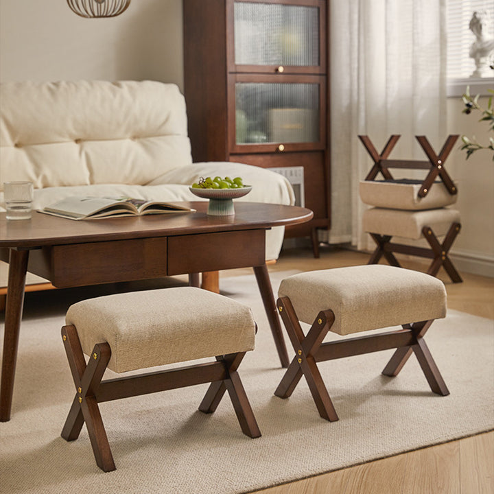 Tabouret bas moderne minimaliste rectangulaire en forme de X avec cadre en bois et tissu en coton et lin pour salon 