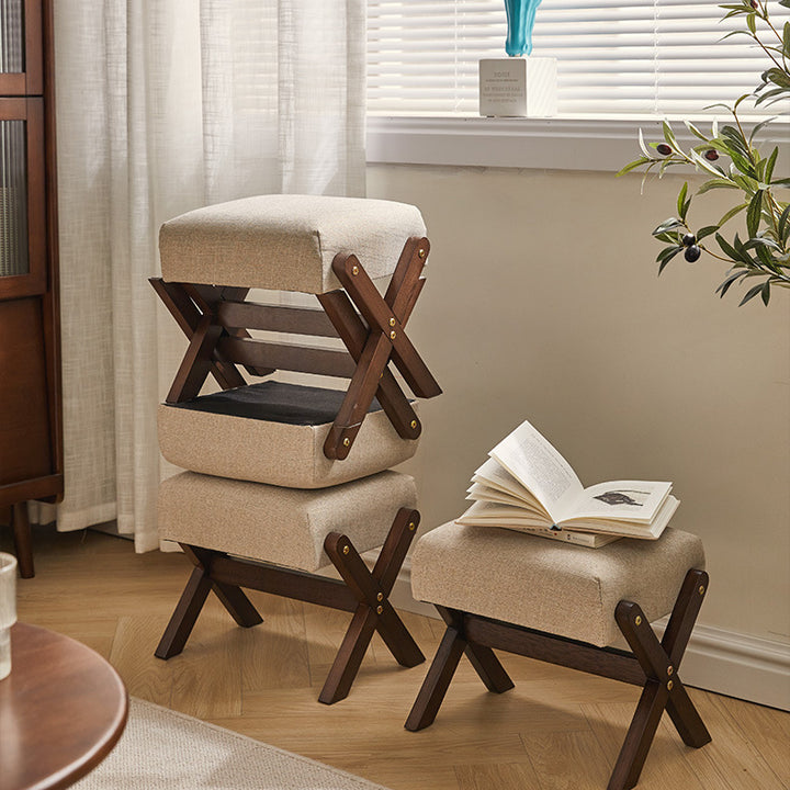 Tabouret bas moderne minimaliste rectangulaire en forme de X avec cadre en bois et tissu en coton et lin pour salon 
