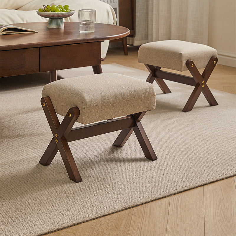 Tabouret bas moderne minimaliste rectangulaire en forme de X avec cadre en bois et tissu en coton et lin pour salon 