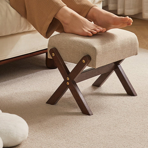 Tabouret bas moderne minimaliste rectangulaire en forme de X avec cadre en bois et tissu en coton et lin pour salon 